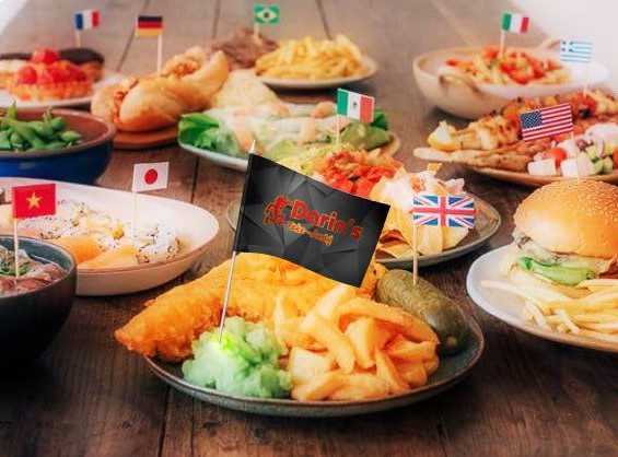 Darin’s table is filled with various international foods.