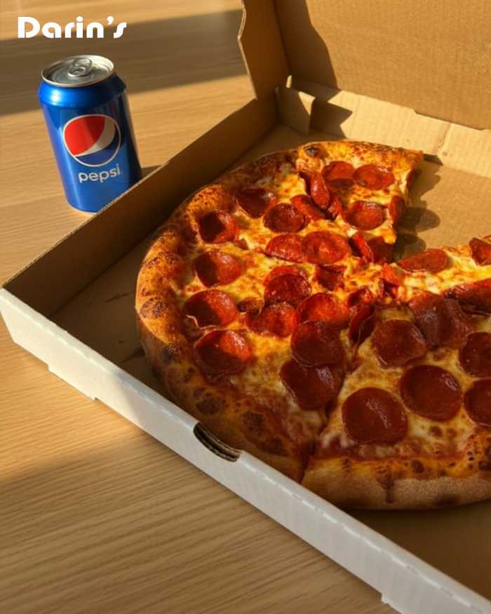 Darin’s freshly baked Pizza with Pepsi in Edinburgh.