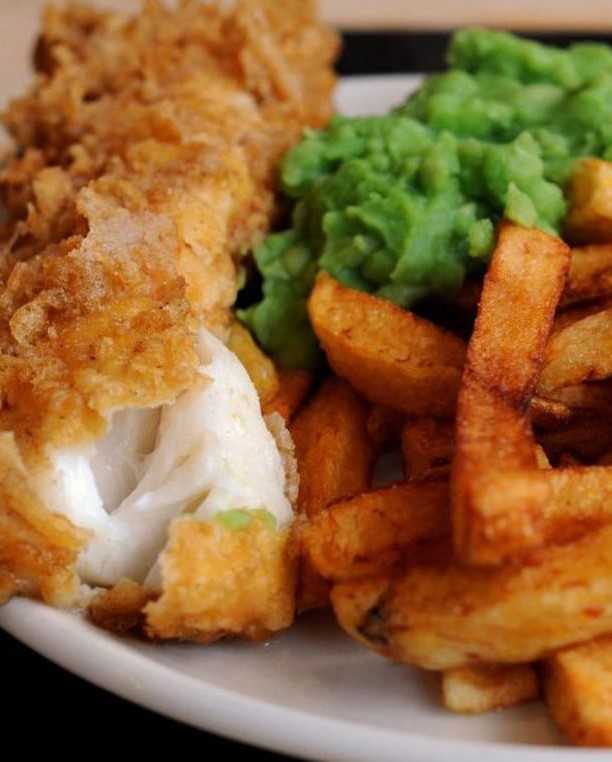 Darin’s crispy fish and Chips with sauce in Edinburgh. 