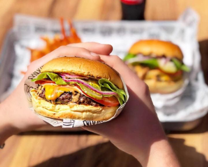 Cheeseburger from Darin's in Edinburgh with melted cheese, lettuce, and tomato.